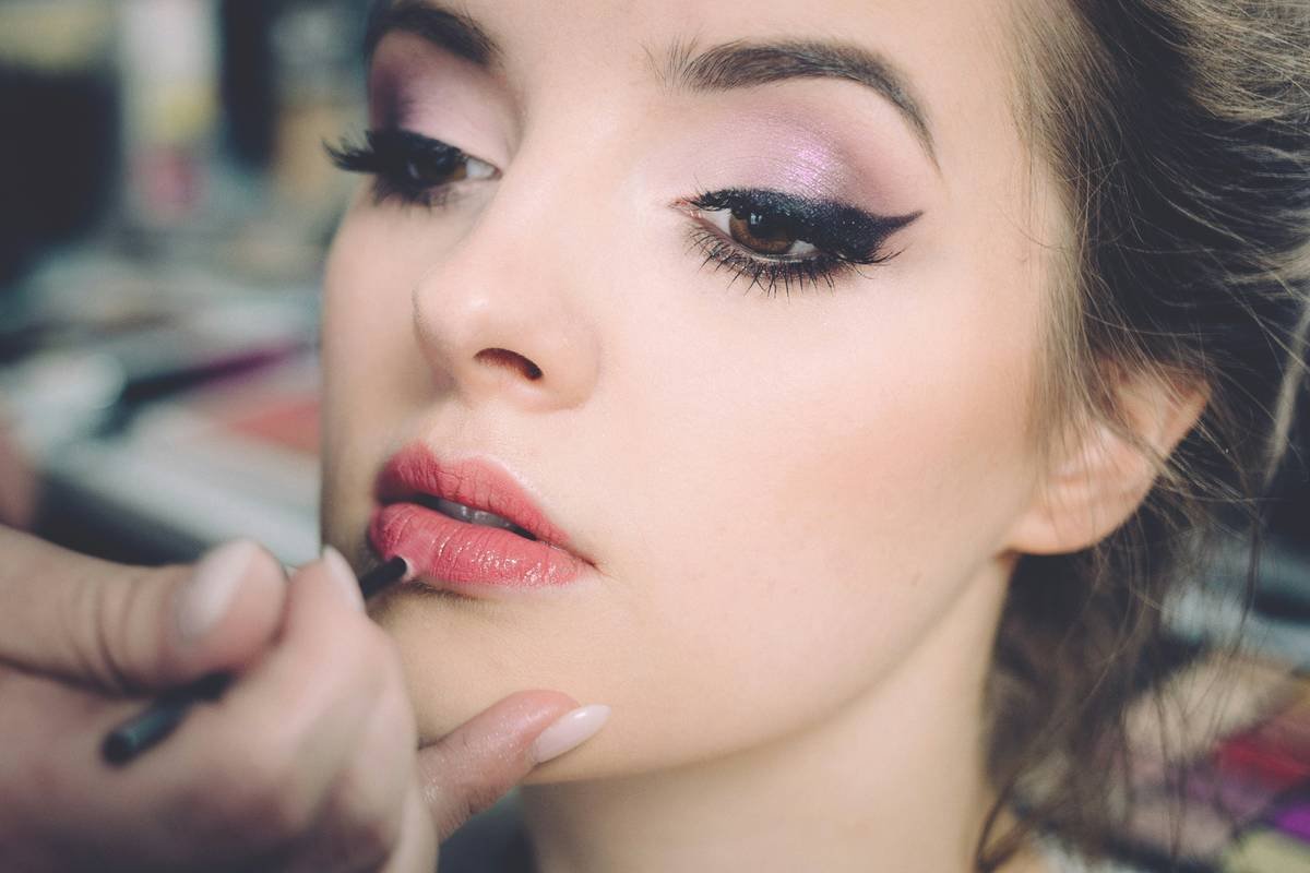 Close-up of bold beauty application result using reusable silicone makeup stencil