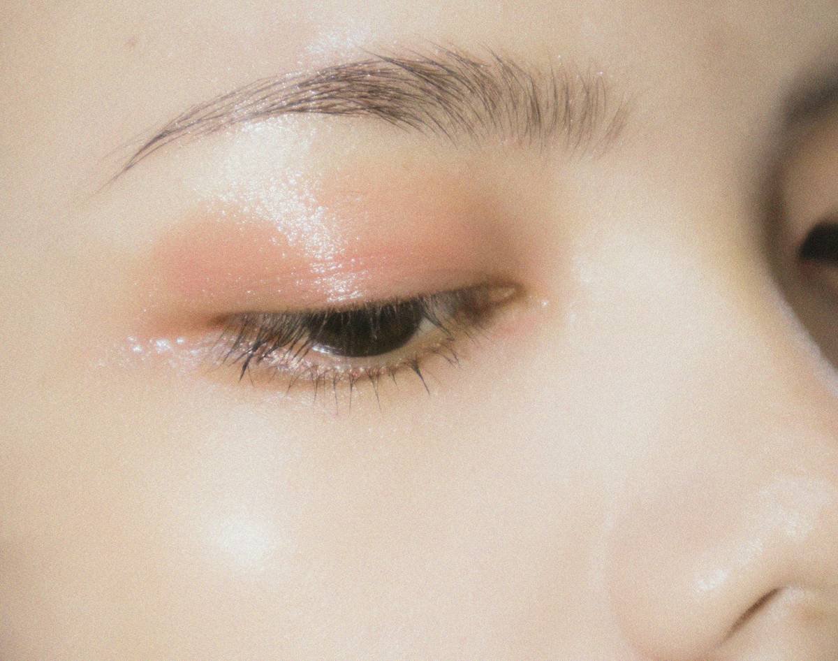 Close-up of artistic makeup techniques showing crisp line created with reusable mylar stencil