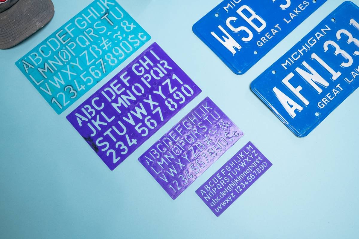 Set of reusable makeup stencils paired with precision applicators for eyes and lips